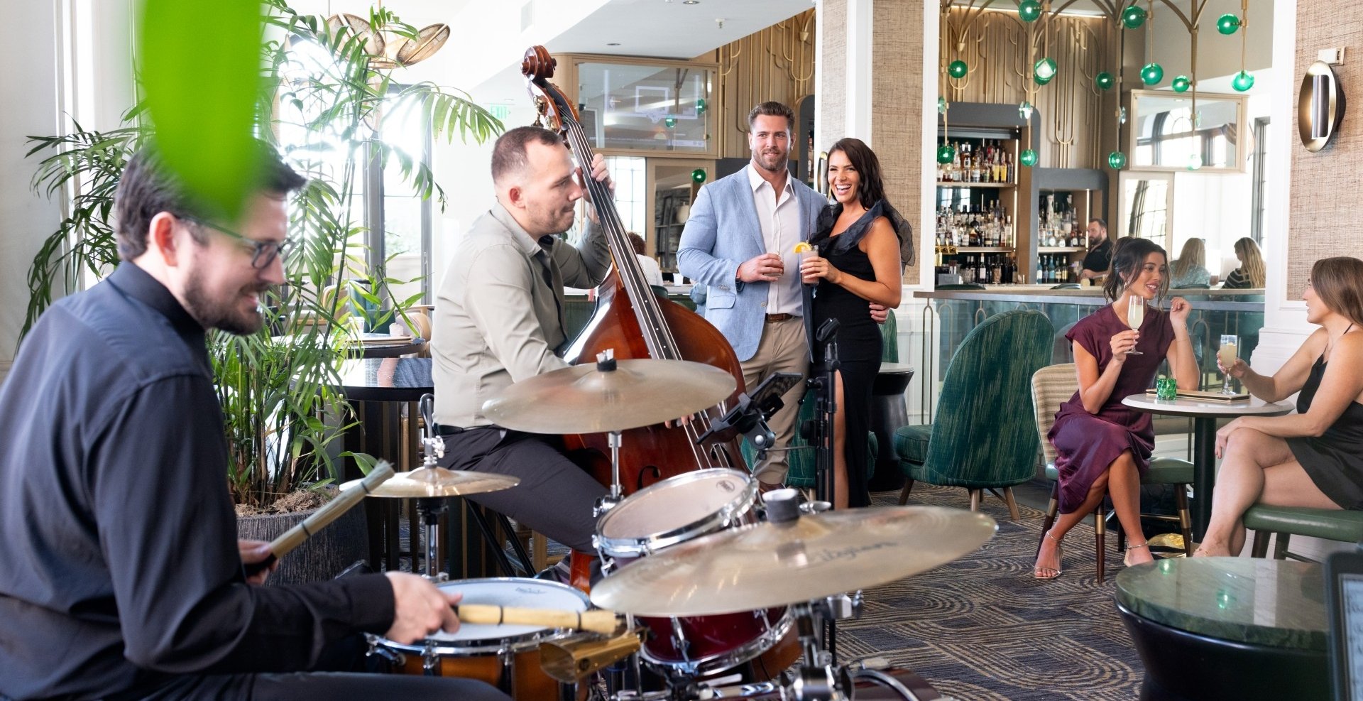 A lively group of musicians performing in a cozy restaurant, creating a joyful atmosphere for diners.