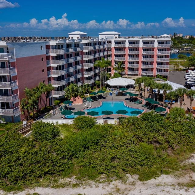 aerial of the hotel, pool, and beach area