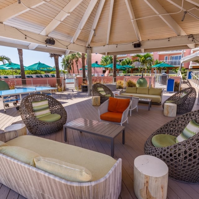 cozy seating area under a large cabana