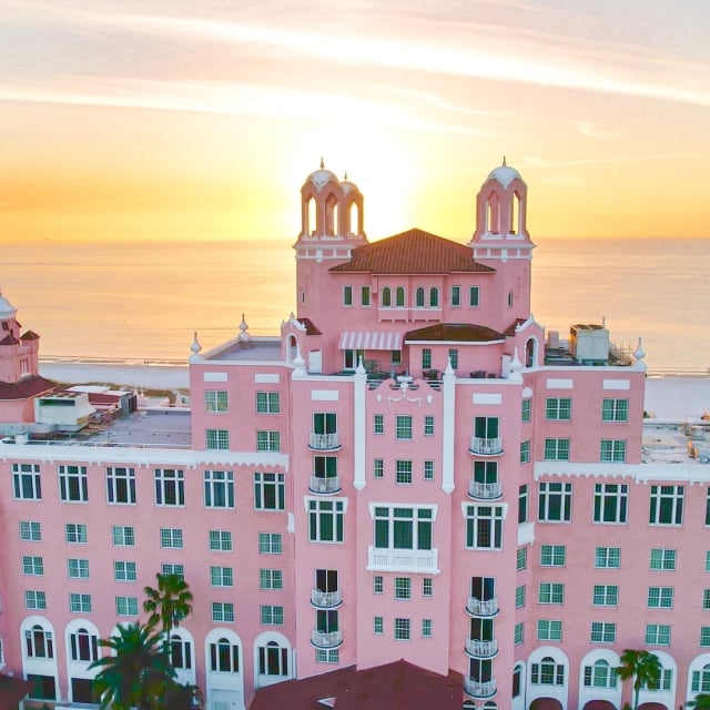 Large pink hotel at sunset