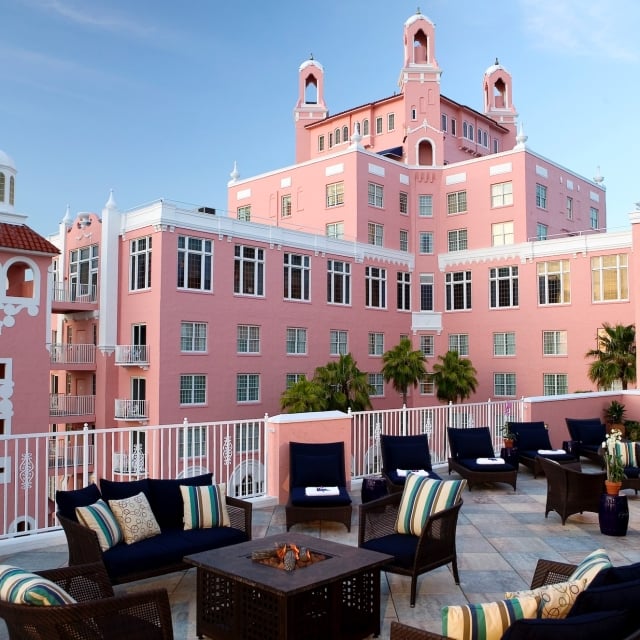 large balcony with various seating areas