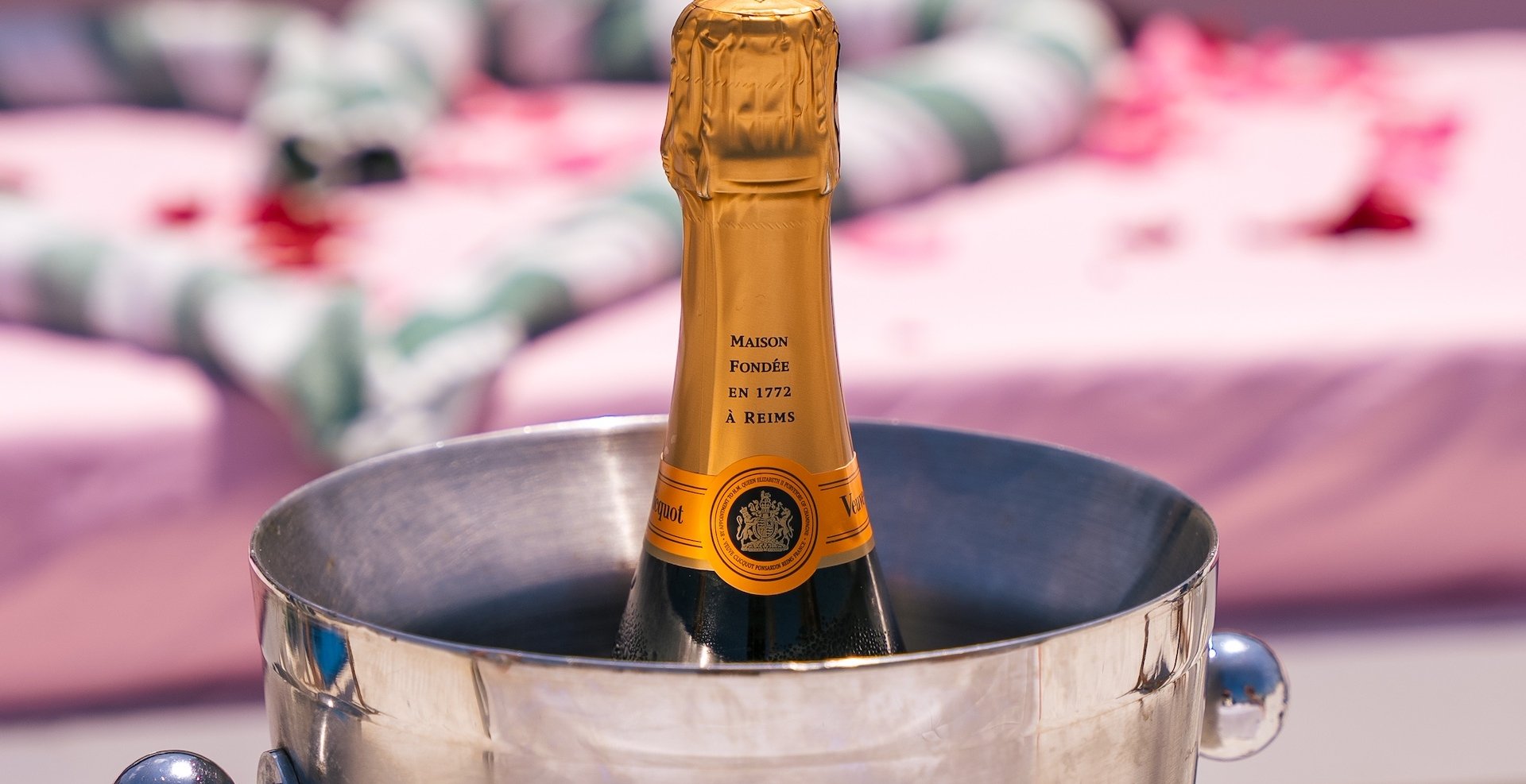 a bottle of champagne in a ice bucket