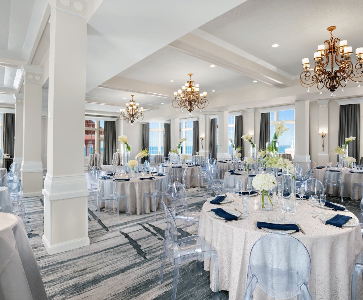 meeting room with round tables and ocean view