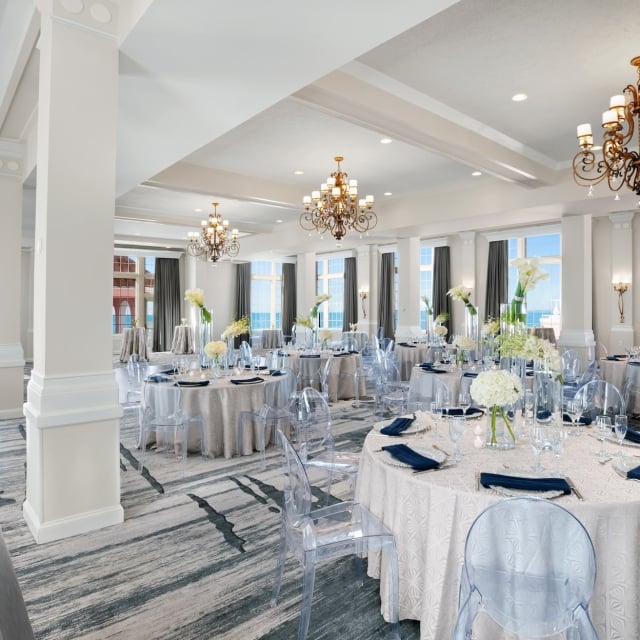 meeting room with round tables and ocean view