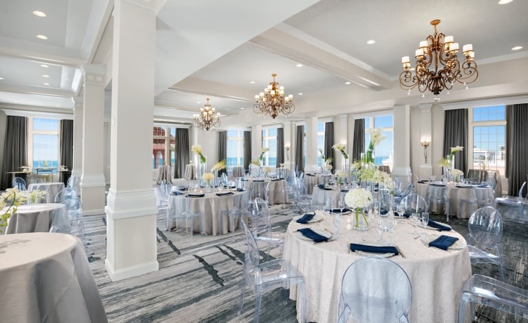 meeting room with round tables and ocean view