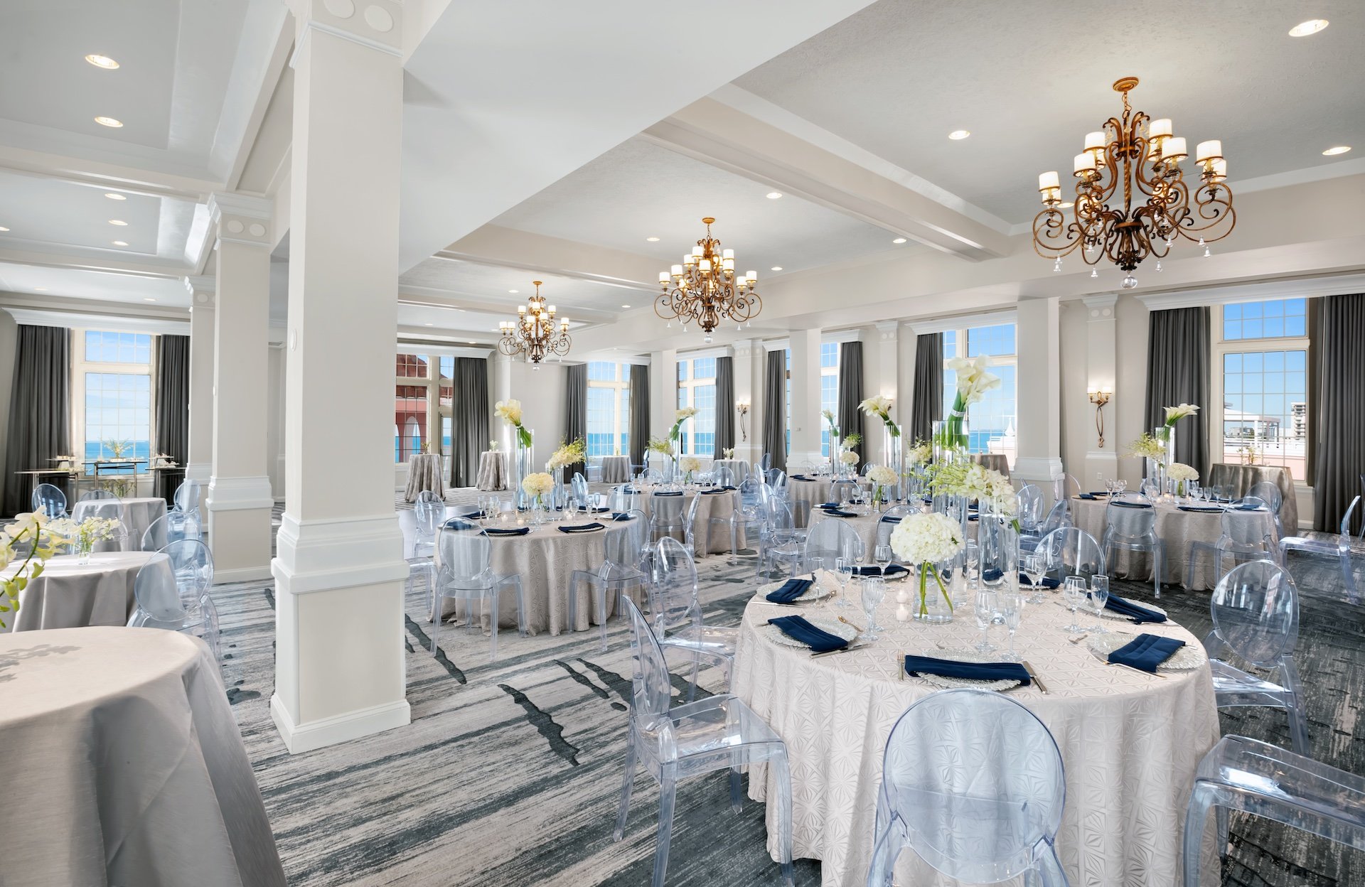 meeting room with round tables and ocean view