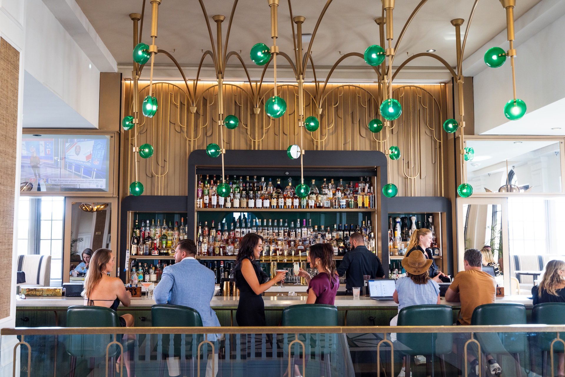 people drinking at a bar