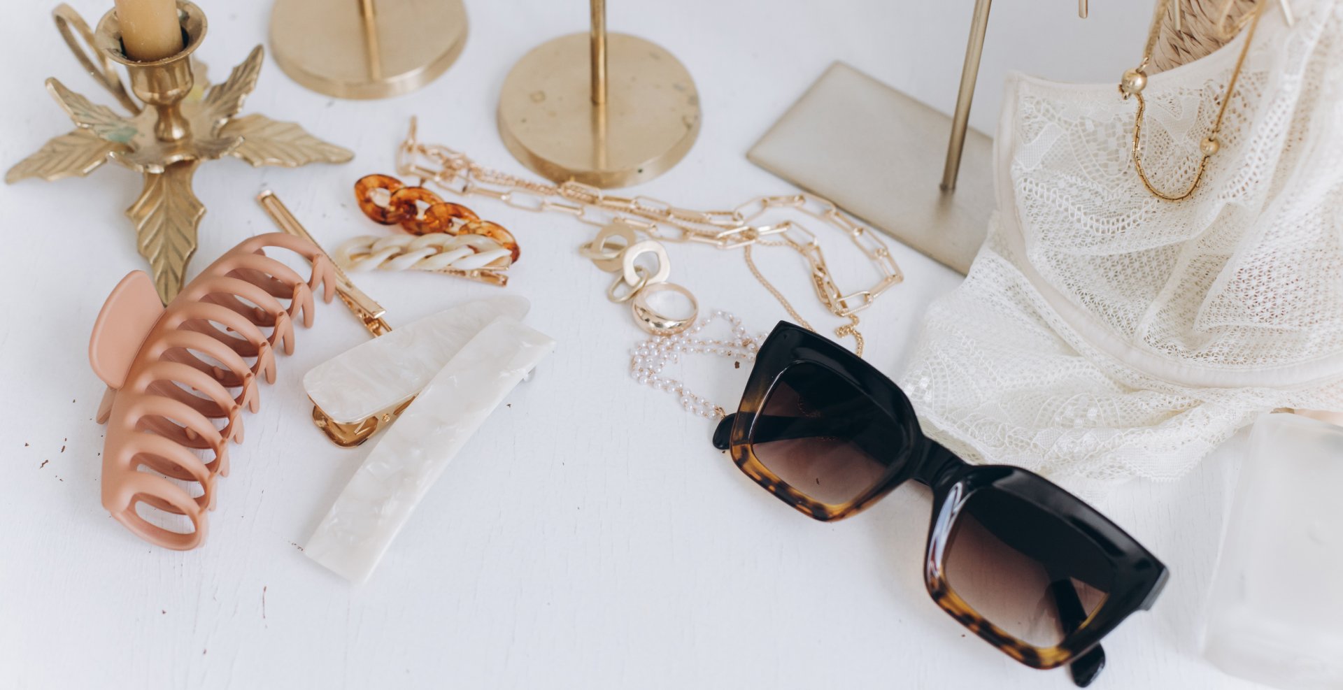 sunglasses and other accessories on a counter