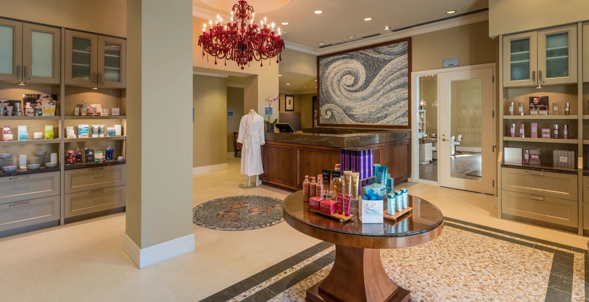 spa entrance with various shelving units displaying wellness products