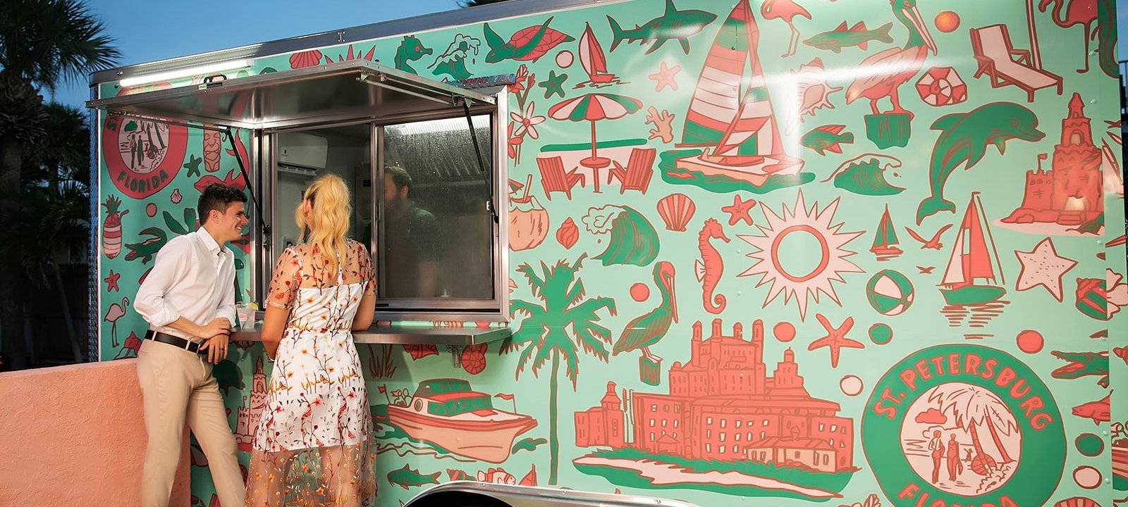 a couple waiting at a food truck